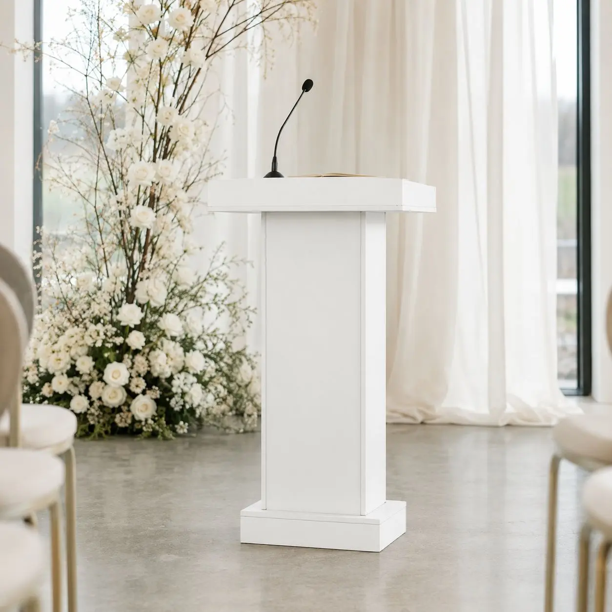 Elegant white podium featuring a clean, modern design. Perfect for wedding ceremonies, speeches, presentations and corporate events. Includes a spacious top and two open storage shelves at the back.
